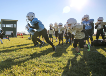 Football medical tent on the field. See why teams use this for quick and private injury assessment.
