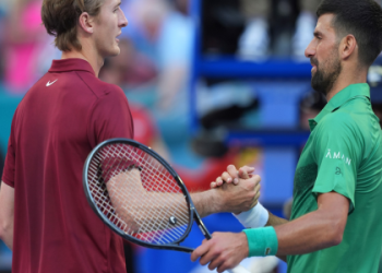 The meaning behind Novak Djokovics Christian cross necklace?